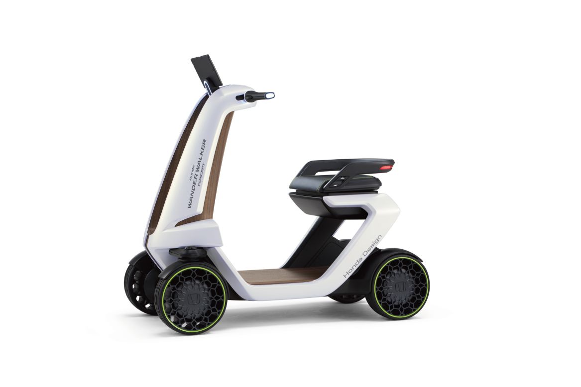 At the same event, Honda will also unveil the Wander Walker, a four-wheeled electric scooter that sports some very retro-looking wood trims.