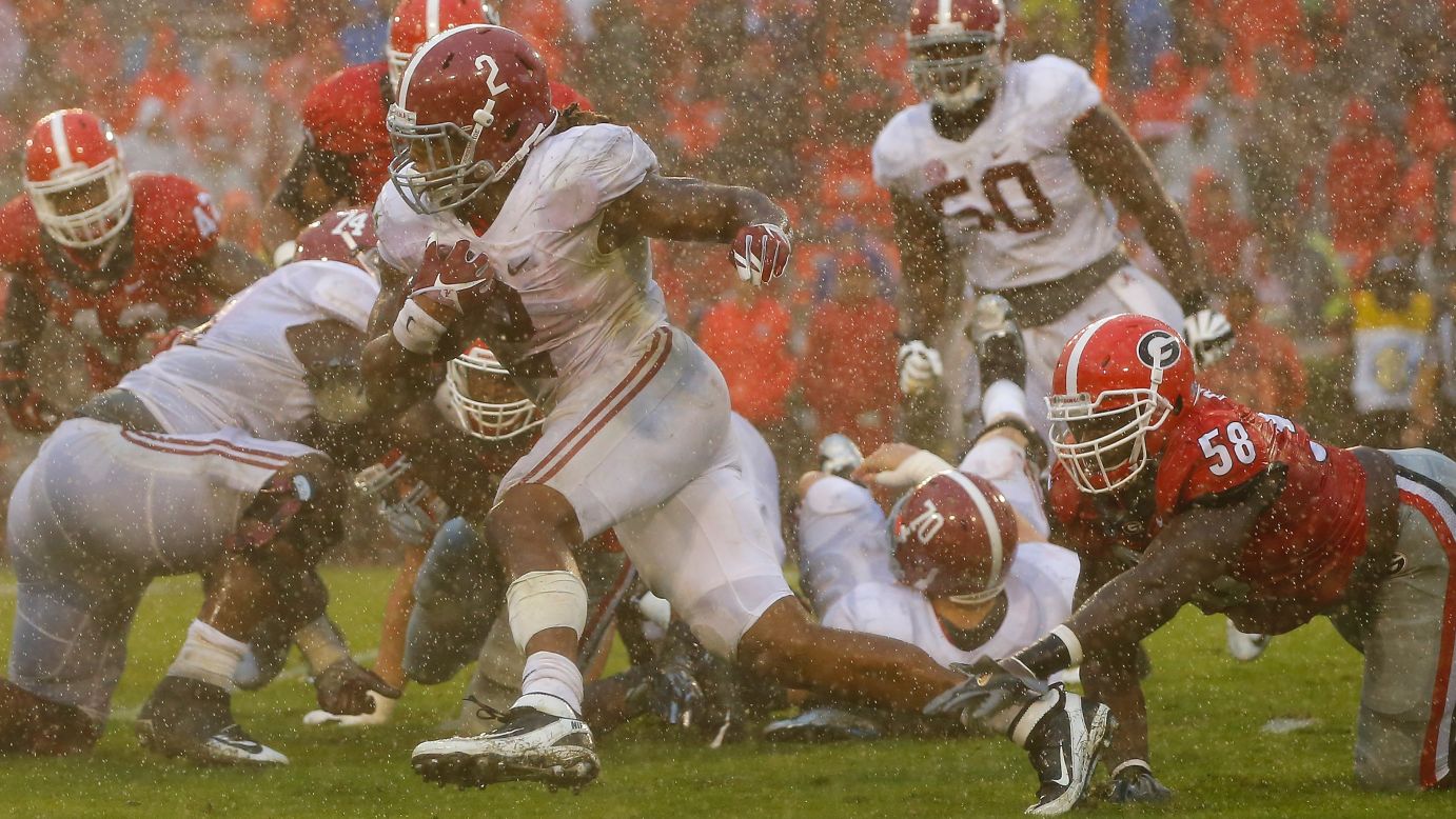 Alabama running back Derrick Henry breaks a tackle at Georgia on Saturday, October 3. Henry had 148 yards rushing as the Crimson Tide rolled to a 38-10 victory.