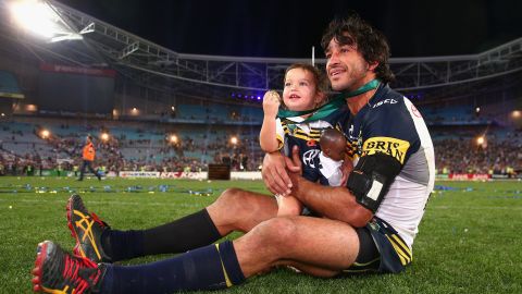 Johnathan Thurston, captain of the North Queensland Cowboys, holds his daughter, Frankie, after his team won the National Rugby League's grand final Sunday, October 4, in Sydney. Images of the two <a href="http://www.bbc.com/news/world-australia-34440600" target="_blank" target="_blank">went viral on social media</a> after people noted Frankie's dark-skinned doll.