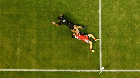 Julian Savea scores a try for New Zealand as he is tackled by Georgia's Giorgi Aptsiauri at the Rugby World Cup on Friday, October 2. New Zealand won 43-10, becoming the first team to qualify for the quarterfinals.