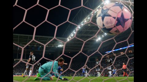 The ball bulges the net after Porto's Andre Andre (not pictured) scored a goal against Chelsea during a Champions League match Tuesday, September 29, in Porto, Portugal. Porto won the match 2-1.