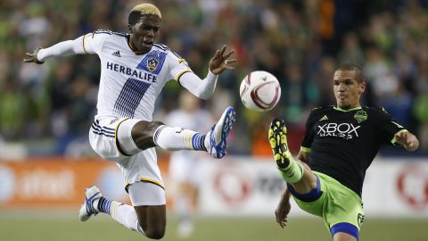 Los Angeles forward Gyasi Zardes, left, battles for the ball with Seattle's Osvaldo Alonso during a Major League Soccer match in Seattle on Sunday, October 4.