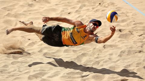 Brazilian beach volleyball player Bruno Oscar Schmidt dives for the ball during the gold-medal match at the World Tour event in Fort Lauderdale, Florida, on Sunday, October 4. Schmidt and Alison Cerutti defeated Americans Nicholas Lucena and Phil Dalhausser. Schmidt is the nephew of Brazilian basketball legend Oscar Schmidt.