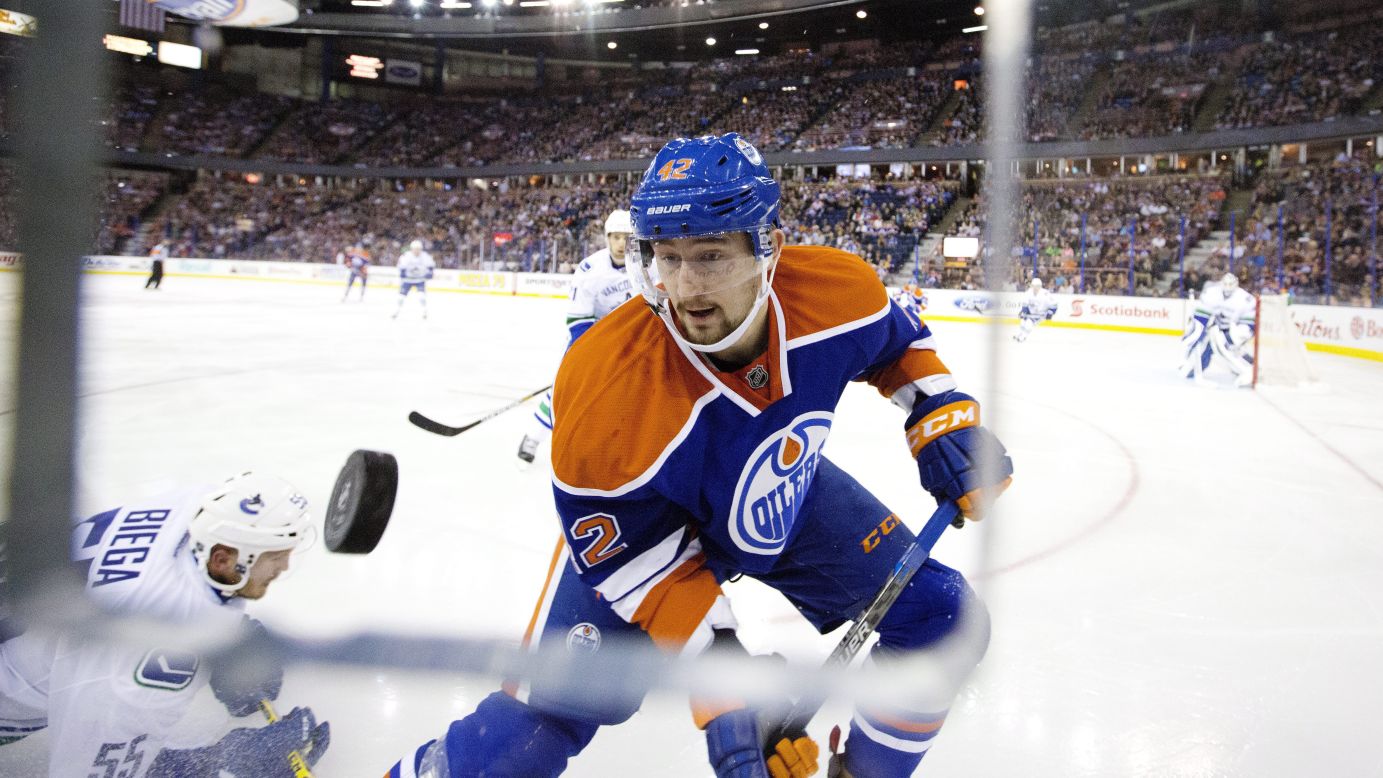 Edmonton's Anton Slepyshev eyes the puck during an NHL preseason game in Edmonton, Alberta, on Thursday, October 1.