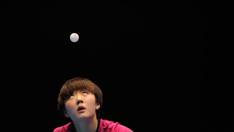 Chen Meng focuses on the ball Friday, October 2, during the women's final at the Asian Table Tennis Championships. An injury later forced her to withdraw from the match against fellow Chinese player Zhu Yuling.