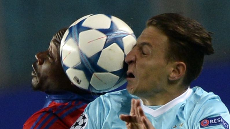 The ball falls between CSKA Moscow's Ahmed Musa, left, and PSV Eindhoven's Santiago Arias during a Champions League match in Moscow on Wednesday, September 30. <a href="index.php?page=&url=http%3A%2F%2Fwww.cnn.com%2F2015%2F09%2F29%2Fsport%2Fgallery%2Fwhat-a-shot-sports-0929%2Findex.html" target="_blank">See 43 amazing sports photos from last week</a>