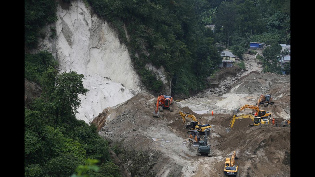Search efforts continue for victims of a deadly landslide in Santa Catarina Pinula, Guatemala, on Monday, October 5. A massive landslide buried much of the El Cambray community near Guatemala City on Thursday, October 1. More than 160 people are dead, and authorities say hundreds remain missing. 