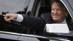 Republican presidential candidate, businessman Donald Trump points and smiles as he arrives at a campaign stop, Wednesday, Sept. 30, 2015, in Keene, N.H. (AP Photo/Steven Senne)