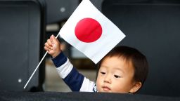 MILTON KEYNES, ENGLAND - OCTOBER 03:  A young Japan fan flies the flag during the 2015 Rugby World Cup Pool B match between Samoa and Japan at Stadium mk on October 3, 2015 in Milton Keynes, United Kingdom.  (Photo by Laurence Griffiths/Getty Images)