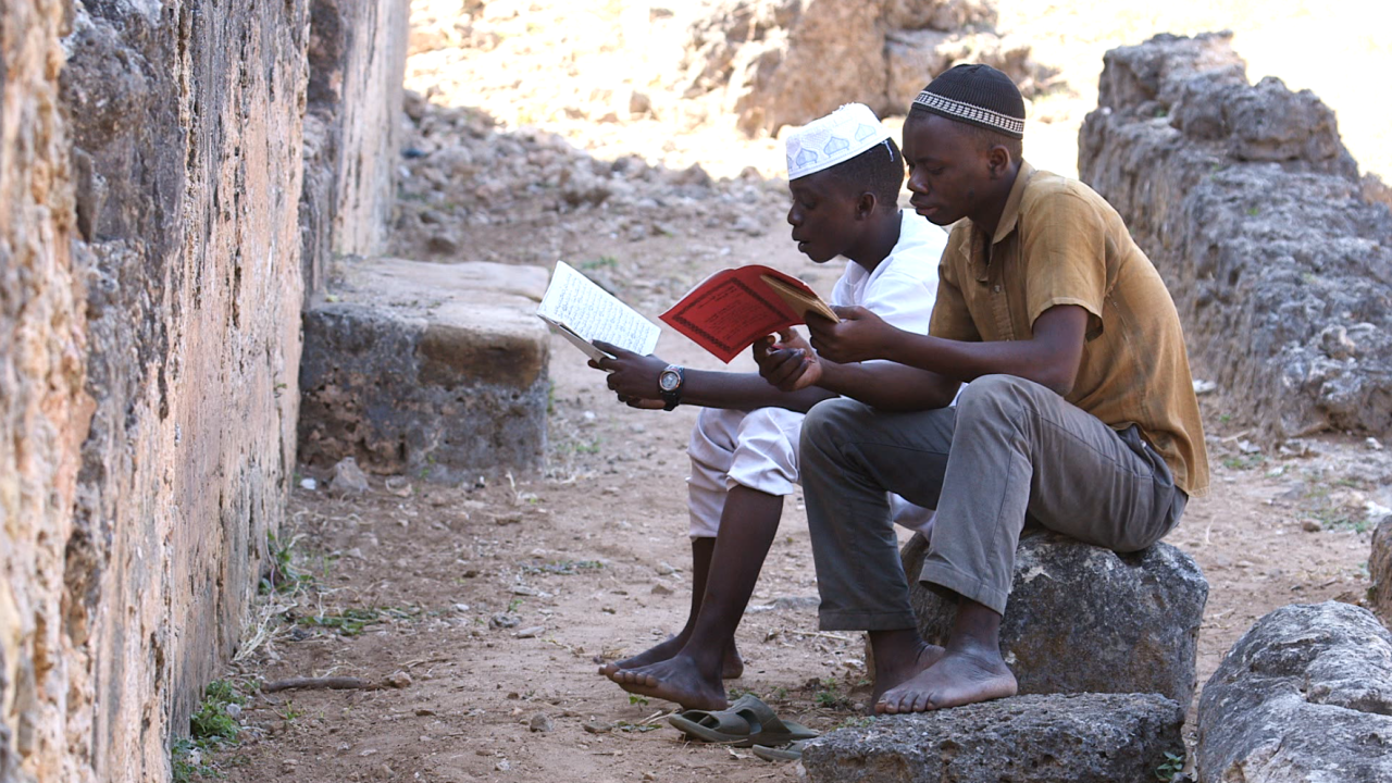 To this day, young Tanzanians are drawn to the Great Mosque at Kilwa to recite Quranic verses.