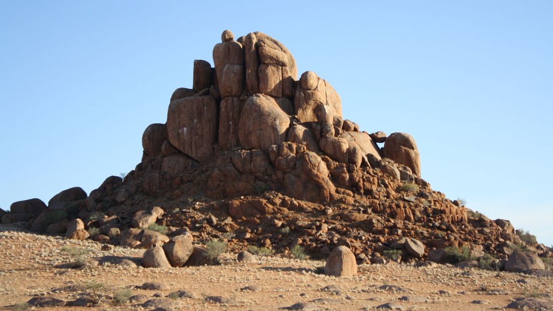 A kopje is an Afrikaans word meaning a small, often rocky, hill in an otherwise flat area. 
