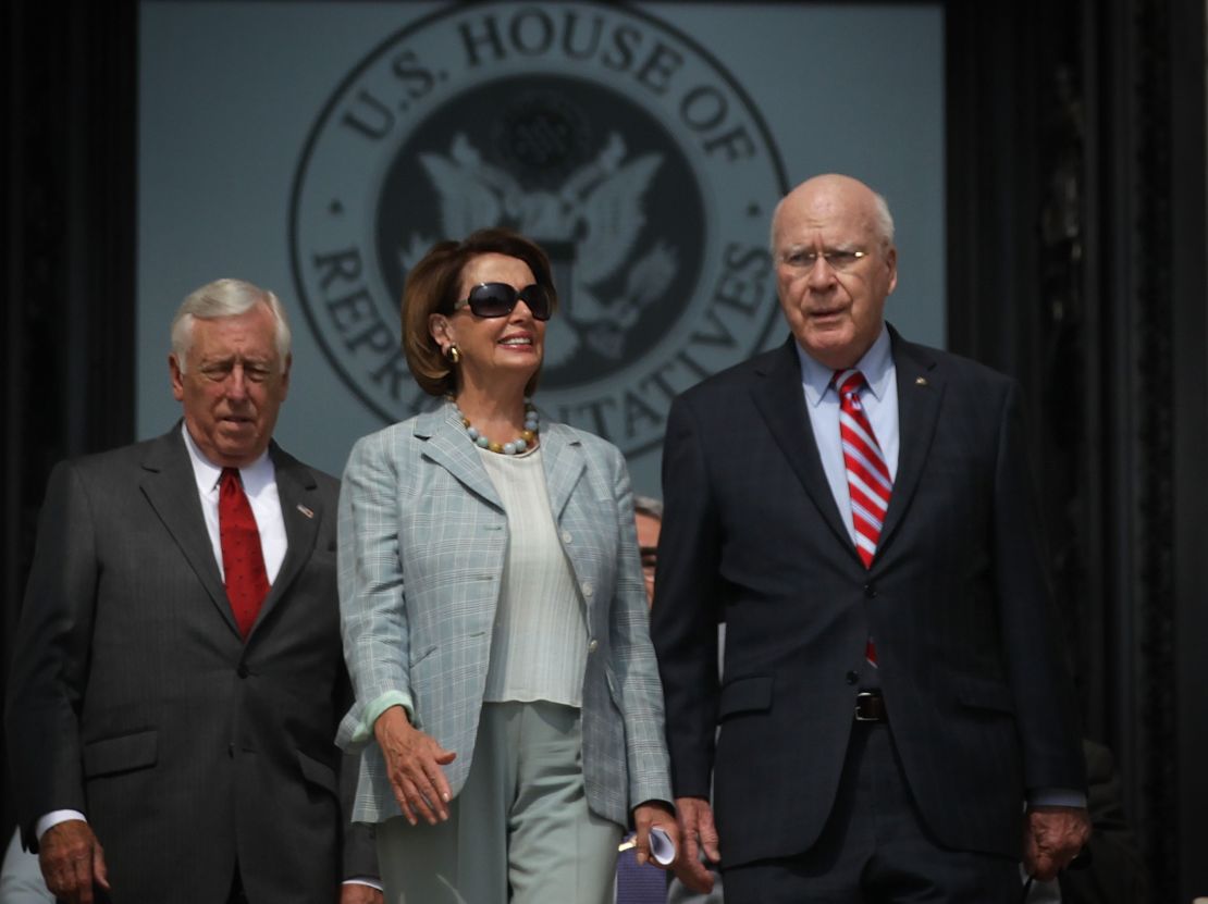 U.S. House Democratic Leader Rep. Nancy Pelosi (D-CA) (C), House Democratic Whip Rep. Steny Hoyer (D-MD) (L) and U.S. Sen. Patrick Leahy (D-VT) (R) come out from the U.S. Capitol for a rally  July 30, 2015 on Capitol Hill in Washington, DC. 