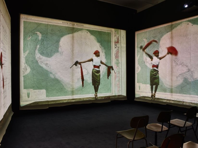 At the center is another film, a three-screen projection called <em>Notes Towards a Model Opera</em>, which shows a ballet dancer reenacting patriotic Chinese revolutionary operas.