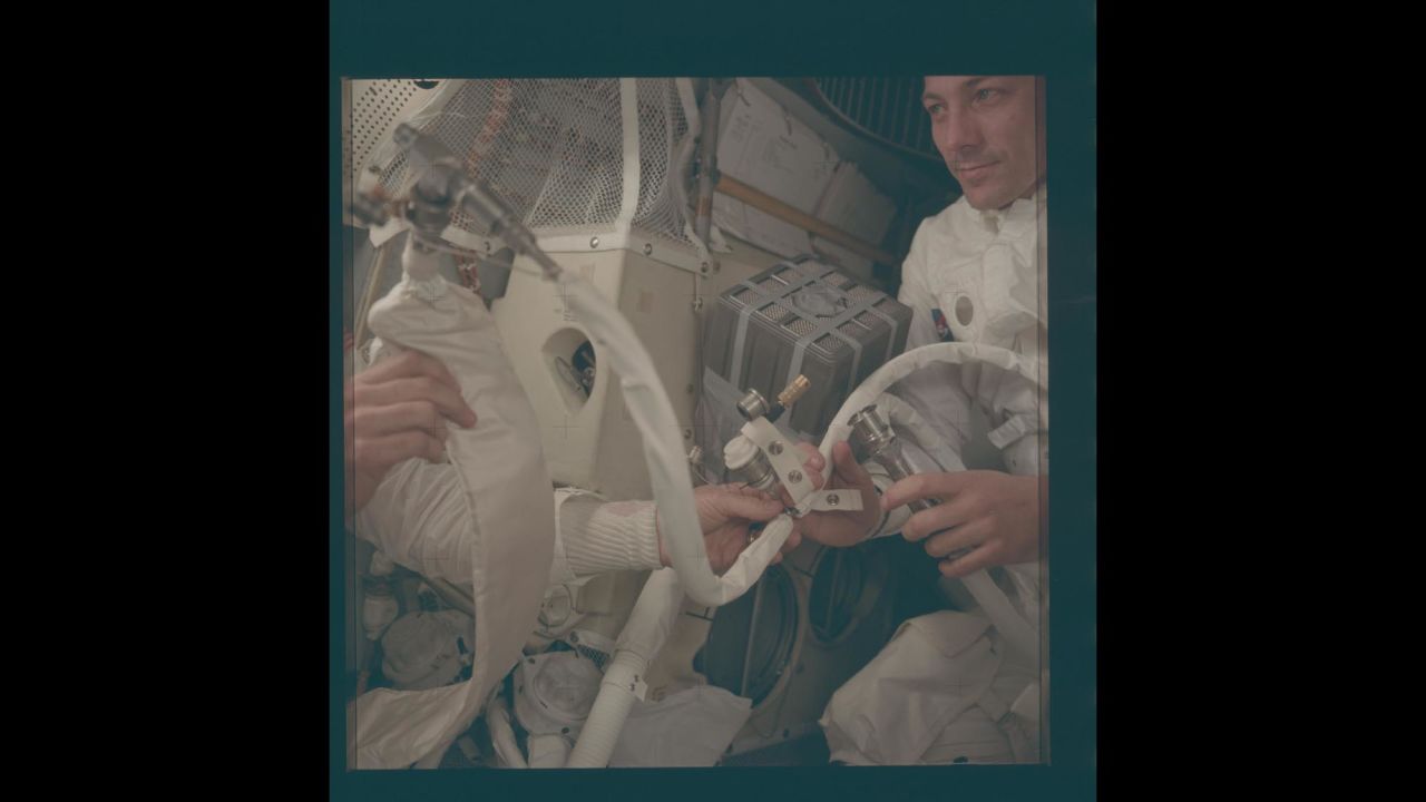 Astronaut John Swigert, right, and the other two astronauts aboard Apollo 13 -- Fred Haise and Jim Lovell -- safely returned to Earth after improvising a solution to the craft's carbon-dioxide removal system.