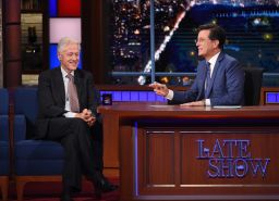 In this image released by CBS, President Bill Clinton, left, appears with host Stephen Colbert during a taping of "The Late Show with Stephen Colbert."