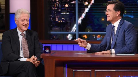 In this image released by CBS, President Bill Clinton, left, appears with host Stephen Colbert during a taping of "The Late Show with Stephen Colbert."
