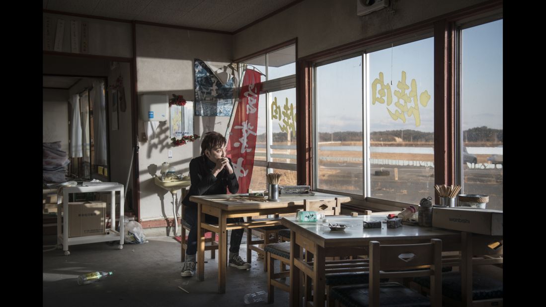 Masayoshi Kawada sits in a ramen restaurant in Namie.