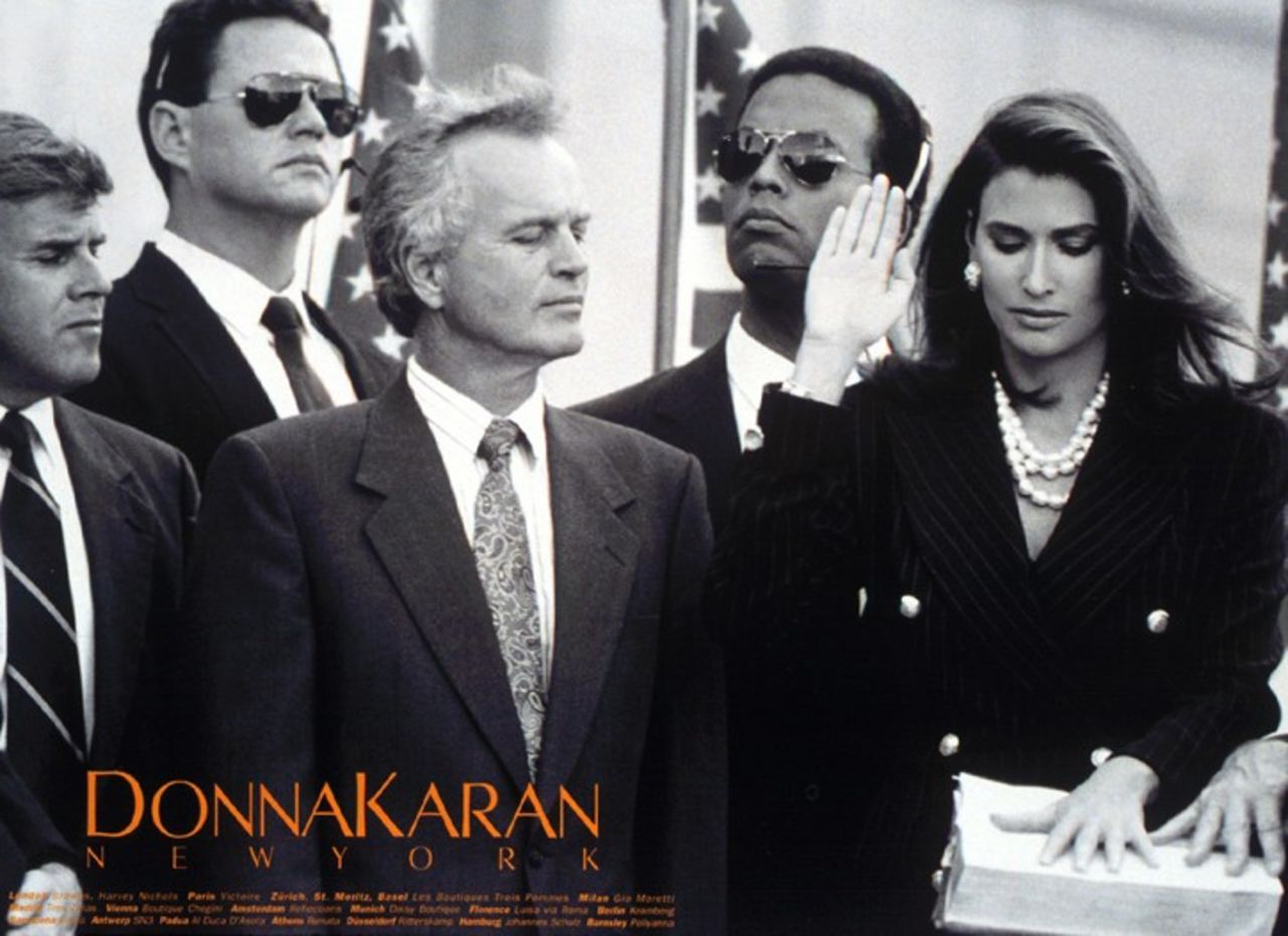 Donna Karan's eight-page 'In Women We Trust' campaign depicted a woman on a campaign trail, being sworn in as president, and sitting in the Oval Office. "I'm not trying to elevate women at the expense of men, but to say that a woman could go for it," Karan explained at the time. In a world that is still yet to see a female president, her message of equal opportunity was a challenge to the patriarchy that prevails decades after its publication.