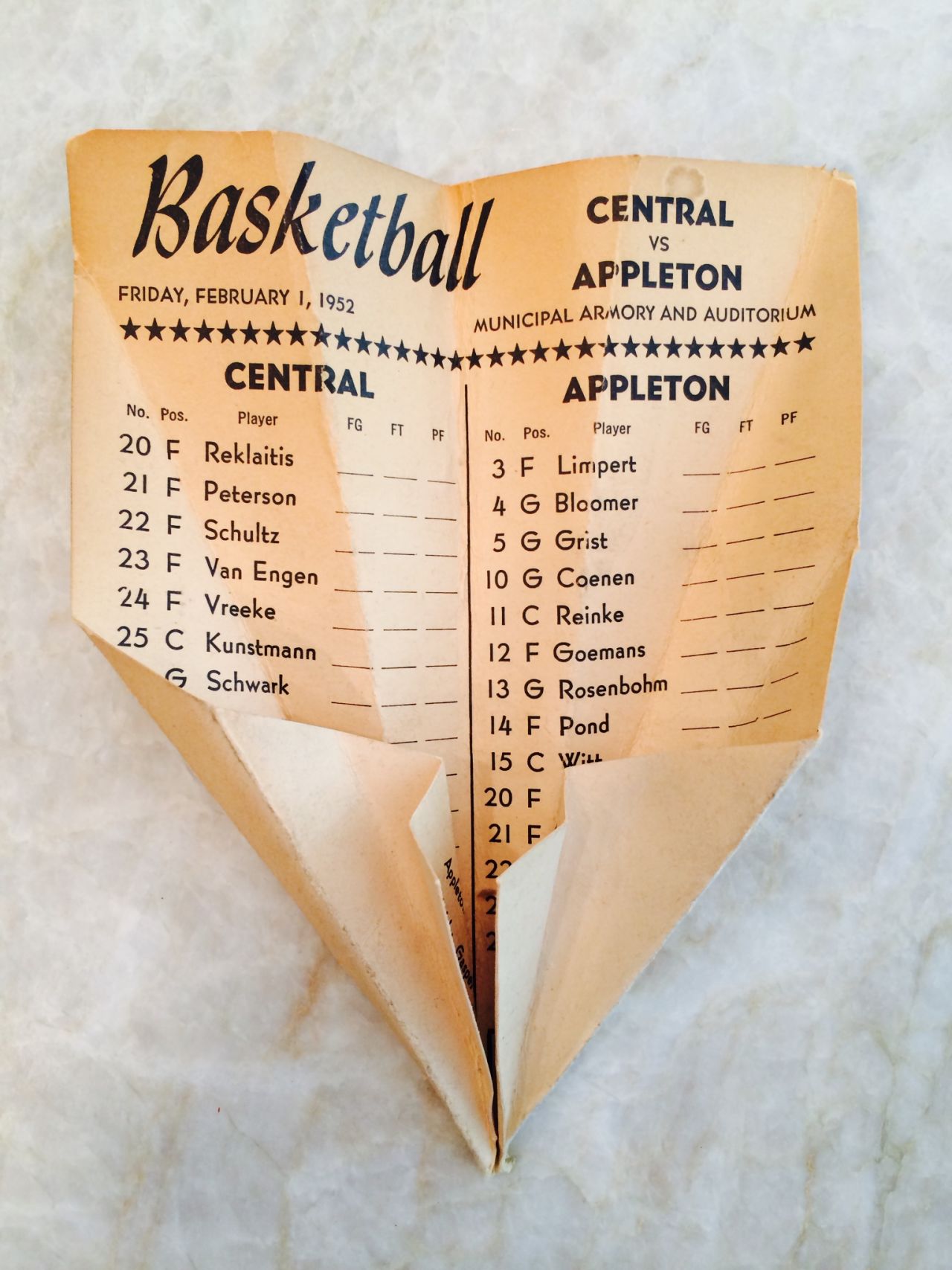 Scraps of old paper from those times can still be found in the Armory today. CNN's Don Riddell discovered this piece of brown card, folded into the shape of a paper airplane, listing the team lineups from a basketball game on February 1, 1952.
