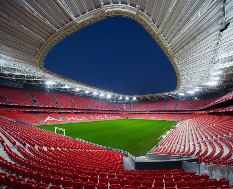 The stadium was designed to replace the previous San Mames stadium, which was over 100 years old and home to the Athletic Bilbao football club. The old structure was previously regarded as the "cathedral" by fans, and this new stadium had to respect the heritage of its predecessor.  
