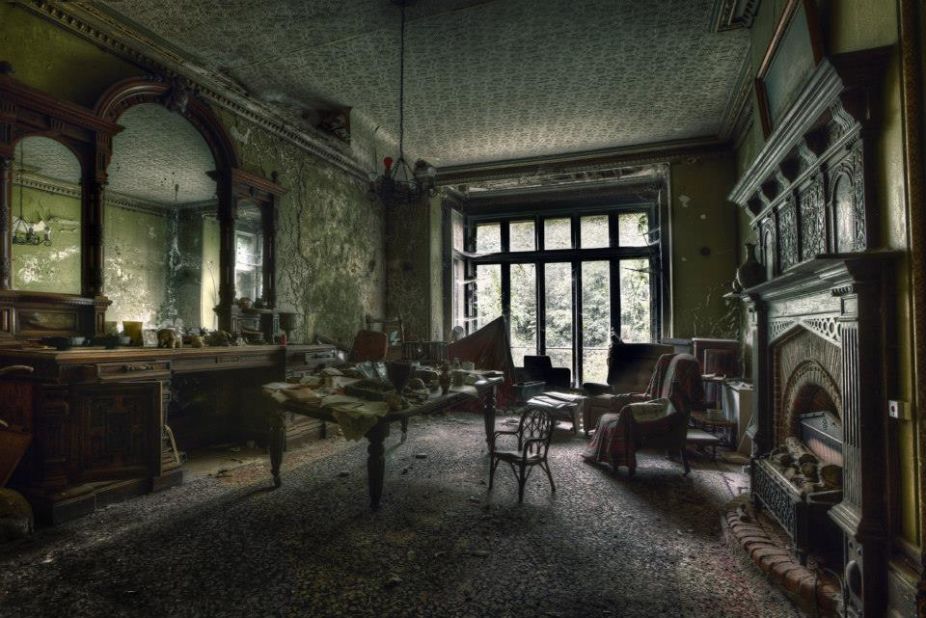 Unlike other photographers featured here, Bathory also stages photo shoots with models in abandoned buildings.<br /><br /><em>Abandoned Victorian Manor</em>