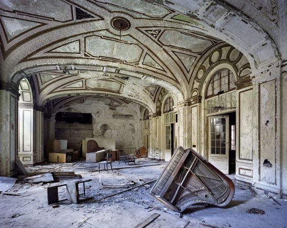 "[Detroit's] splendid decaying monuments are, no less than the Pyramids of Egypt, the Coliseum [<em>sic</em>] of Rome, or the Acropolis in Athens, remnants of the passing of a great Empire," the photographers write on their website. <br /><br /><em>Ballroom, Lee Plaza Hotel, 2006 (Detroit, Michigan) </em>