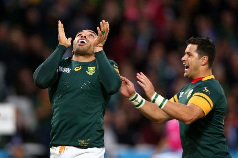 Habana celebrates with Morne Steyn after scoring his second try, and South Africa's sixth of 10 for the match.