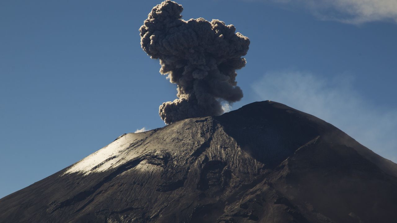 View of the Popocatepetl volcano --the most active of Mexico-- spewing ash seen from the Altzomoni mountain, Mexico On October 29, 2014. AFP PHOTO/Hector Guerrero        (Photo credit should read HECTOR GUERRERO/AFP/Getty Images)