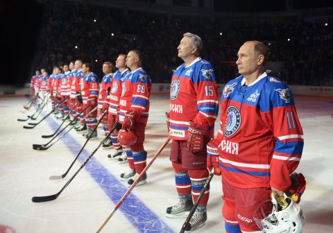 While his nation waded deeper into the Syrian civil war, Russian President Vladimir Putin, right, spent his 63rd birthday on the ice Wednesday, October 7, playing hockey with NHL stars and various Russian officials and tycoons in Sochi.  For years, Russia's leader has cultivated a populist image in the Russian media.