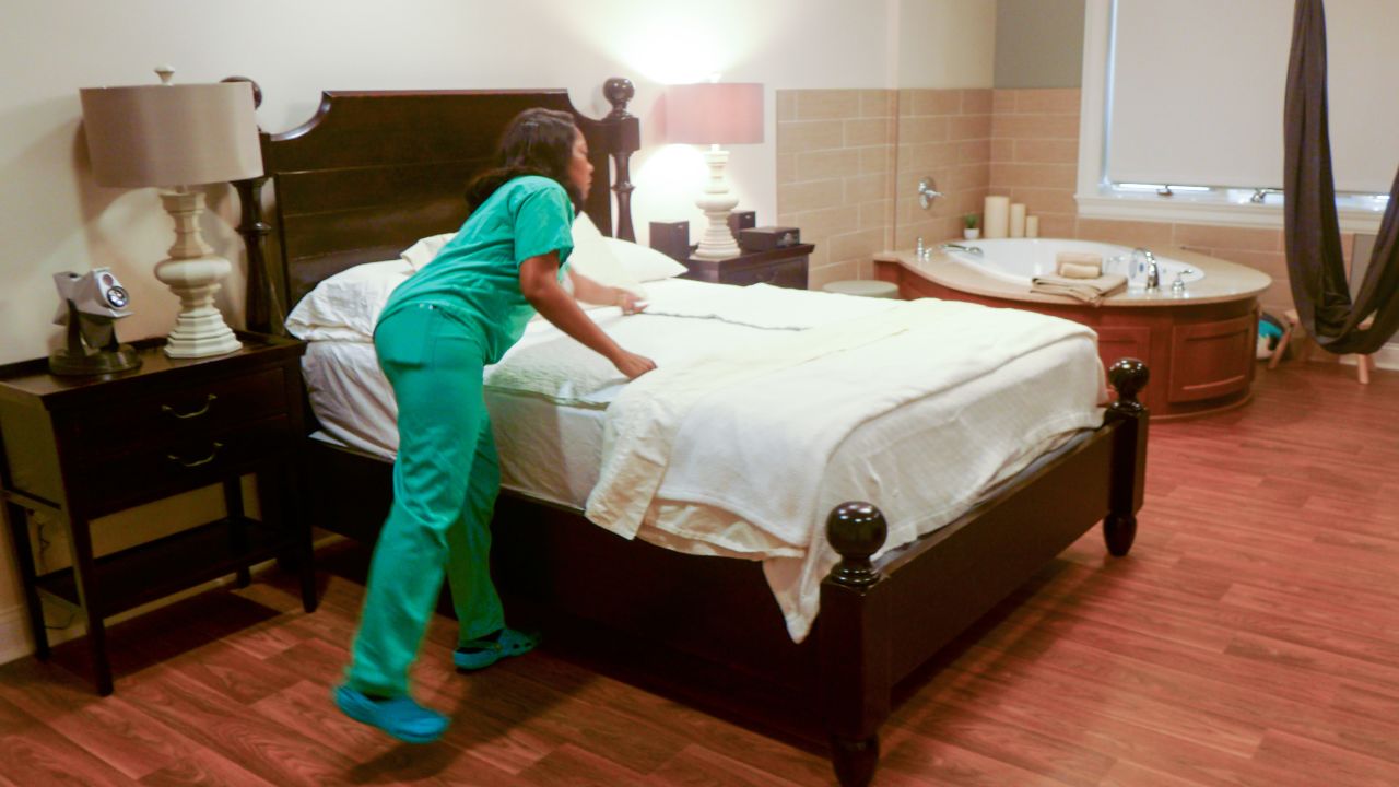 At the Greenville Health System Midwifery Care and Birth Center in Greenville, S.C., women get a plush king size bed, a giant tub and cloth swing to assist them with labor. The room has hardwood floors, mood lighting and high tech sound systems. The center is located in a medical park across the street from the main Greenville hospital.