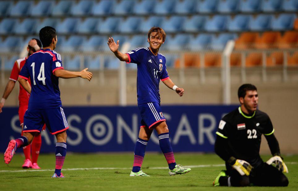 Takashi Usami celebrates scoring Japan's third goal of the game. Japan are one of the most successful nations in the Asian region -- winning the continental championship four times and appearing in the last five World Cups.