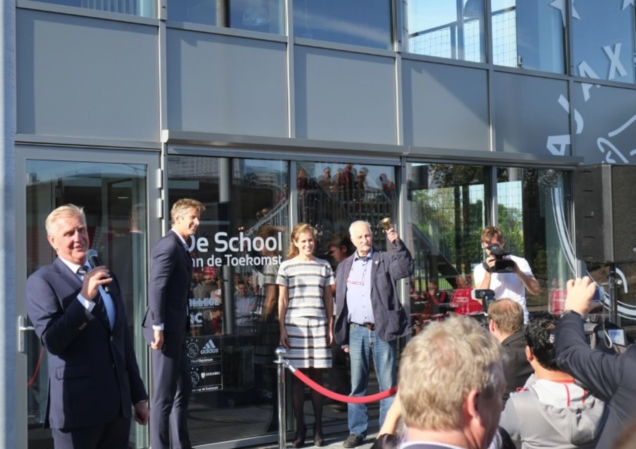 Now as well as developing players' skills on the pitch, the club's aspiring pros can now receive education at a dedicated school. Here the new building school building is officially opened by Ajax marketing director Edwin Van der Sar (second left), who was a former goalkeeper of the Dutch club, as well as Juventus and Manchester United.