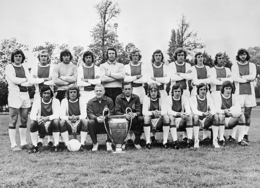 The 1973 Ajax European Cup team poses for a photograph. Front row left to right, Sjaak Swart, Johnny Rep, coach Stephan Kovacs, trainer Bob Haarms, Ger Kleton, Jan Mulder, Cruyff and Gerrie Muhren. Back row, left to right, Arie Haan, Horst Blankenburg, Sies Wever, Wim Suurbier, goalkeeper Heinz Stuy, Piet Keizer, Ruud Krol, Heinz Schilcher, Arnold Muhren, Johan Neeskens and Barry Hulshoff.