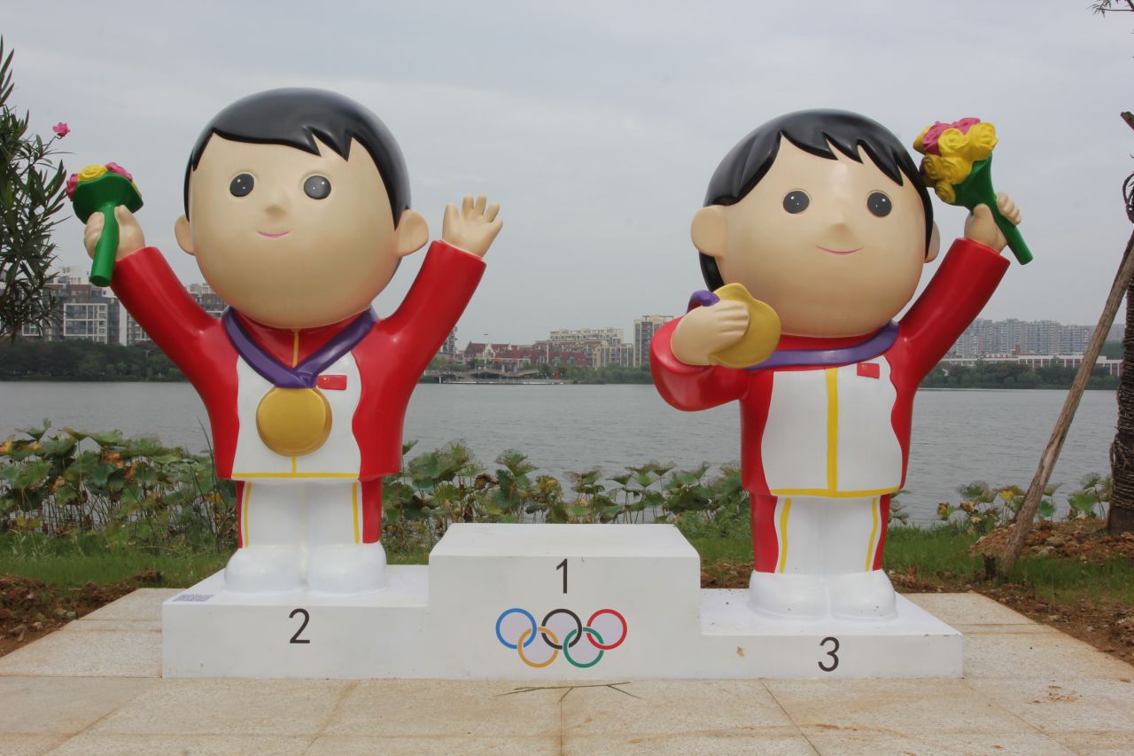 Communist Party members aren't the only people featured at the South Lake Happiness Bay Water Park. Olympic champions are also celebrated. 