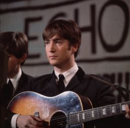 Lennon during an early TV appearance in 1963.