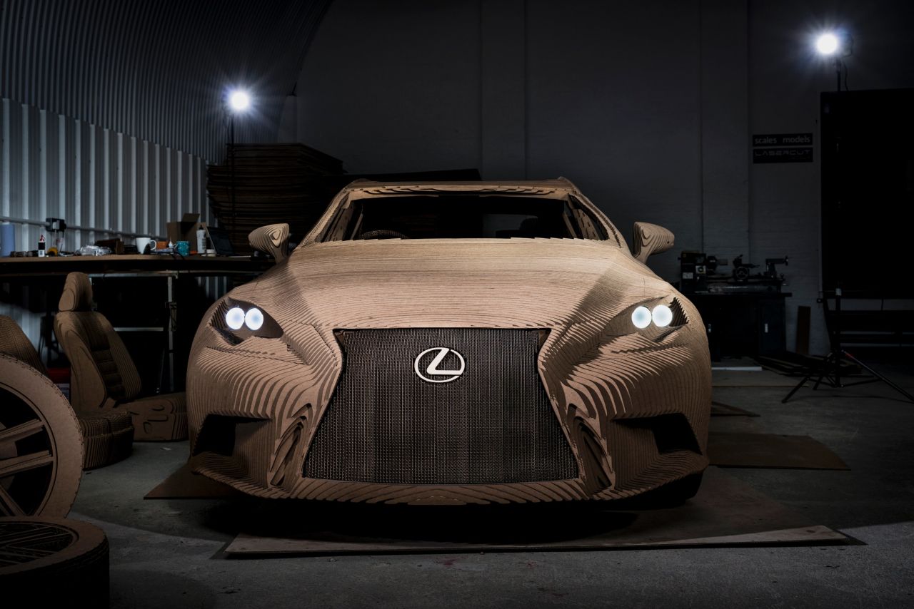 The cardboard car contains no sheet metal, glass or plastics, but is built on a steel and aluminium frame.