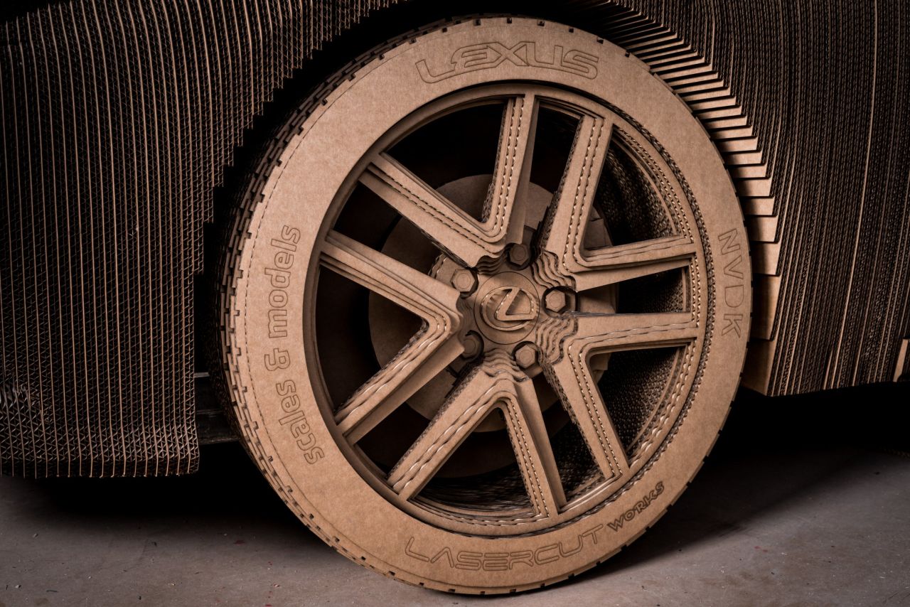 The rolling wheels are branded with the names of the three companies involved, Lexus, and London-based Scales & Models and LaserCut Works.