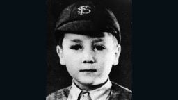 "Strawberry Fields Forever." The young John as a schoolboy, circa 1948, with the cap, tie and blazer; the uniform of a bygone age.