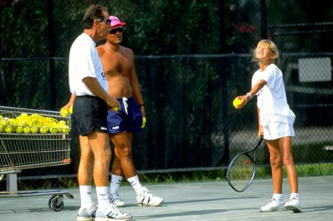 Legendary tennis coach Nick Bollettieri (far left) started training Kournikova at his Florida Academy when she was just 10 years old.<br />"When I hear the name 'Anna Kournikova' now, the phrase that springs to my mind is: 'She's my baby,'" said Bollettieri.<br />"She started the big wave of players from Russia -- don't forget that."