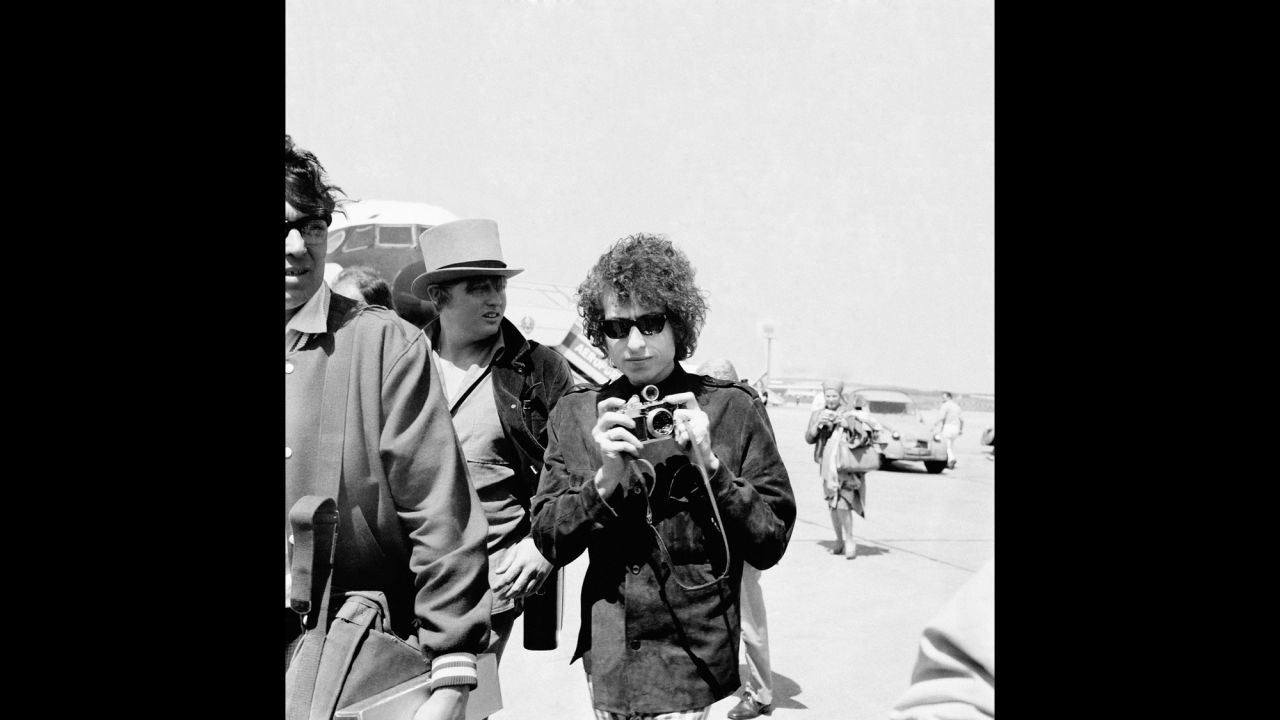 Many of the concerts were raucous affairs, with audience members yelling at Dylan and Dylan yelling back. (The Manchester, England, show was captured on "Live 1966: The 'Royal Albert Hall' Concert.") Dylan left for France on May 22; this photo shows him arriving at Le Bourget Airport in Paris.