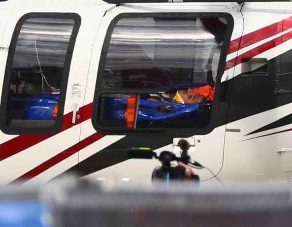 Sainz is airlifted to hospital in a helicopter after he crashed during final practice for the F1 Grand Prix at Sochi in Russia.