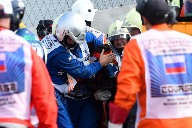 Doctors assist Sainz after his horror crash.