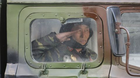 A North Korean soldier salutes during the military parade on Kim Il Sung Square.