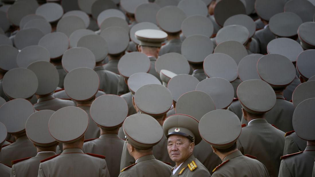 North Korean veterans gather at the start of the parade.