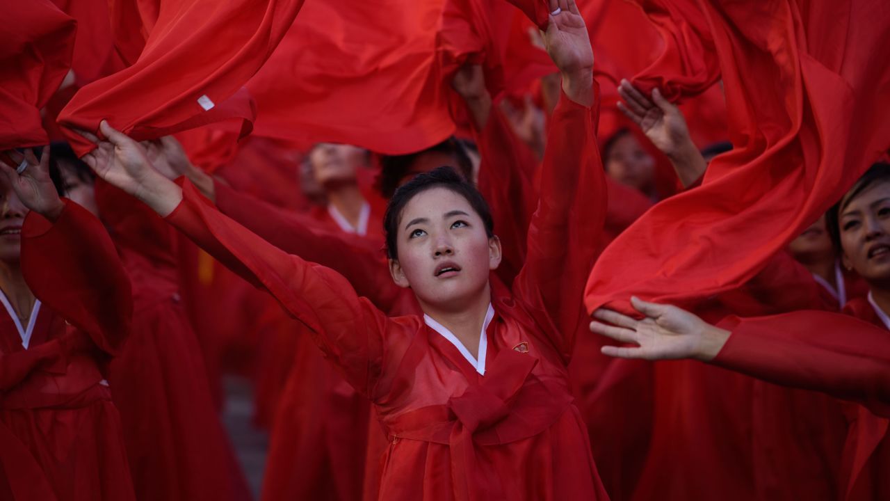 North Korean dancers perform during the parade at Kim Il Sung Square.