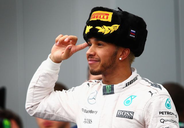 Hamilton celebrates on the podium after winning the Russian Grand Prix at Sochi to extend his title lead to 66 points with his ninth victory of the season.