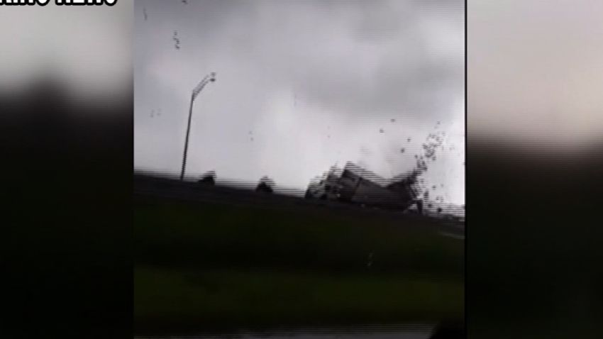 NS Slug: FL: WATERSPROUT DAMAGES US MAIL TRACTOR TRAILER    Synopsis: Waterspout/tornado crosses Sunshine Skyway Bridge in Tampa, rips apart mail truck    Keywords: FLORIDA TAMPA BAY SUNSHINE SKYWAY BRIDGE U.S. POSTAL SERVICE TRUCK