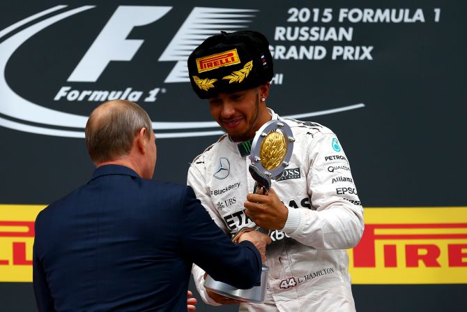 Putin presented Hamilton with the winner's trophy at the 2015 Russian Grand Prix. 