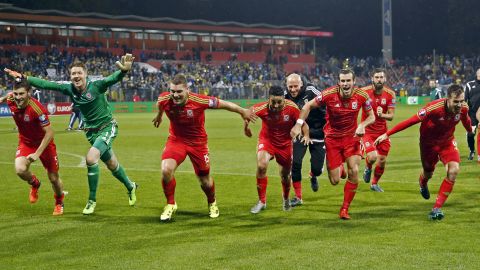 Welsh soccer players celebrate Saturday, October 10, after learning that they had qualified for the European Championship next summer. Euro 2016 will be Wales' first major tournament since the 1958 World Cup.