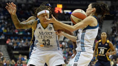 Minnesota teammates Seimone Augustus, left, and Anna Cruz go after a loose ball during Game 2 of the WNBA Finals on Tuesday, October 6. Minnesota and Indiana split the first four games of the series, and the decisive Game 5 will take place on Wednesday, October 14.